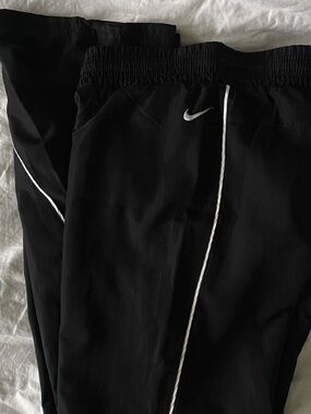 Nike Black Track Pants with White Piping and Swoosh